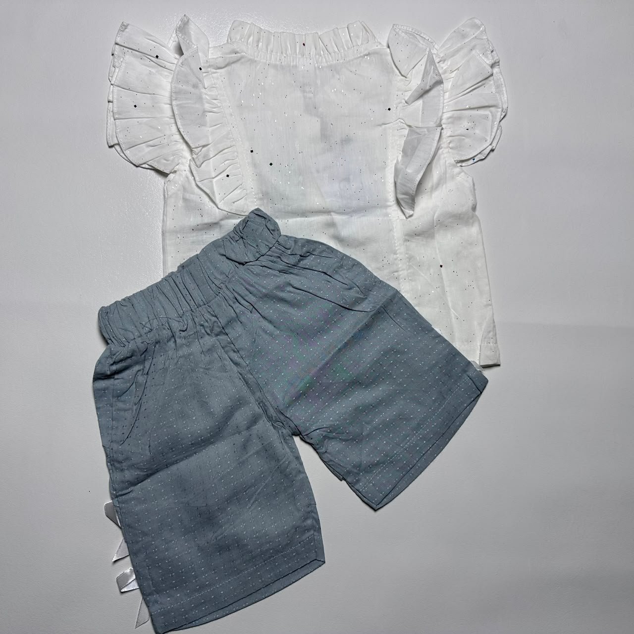 Baby Girls Ruffled Sparkly Top and Bow-Accented Shorts Set - Image 2